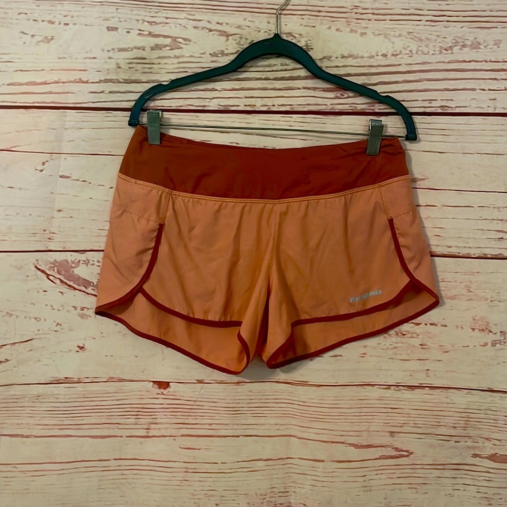 PATAGONIA medium pale pink running shorts with lining